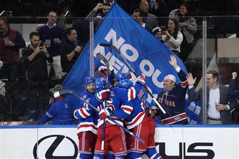 Lafreniere has goal and 2 assists, Domingue makes 25 saves as Rangers beat Wild 4-1